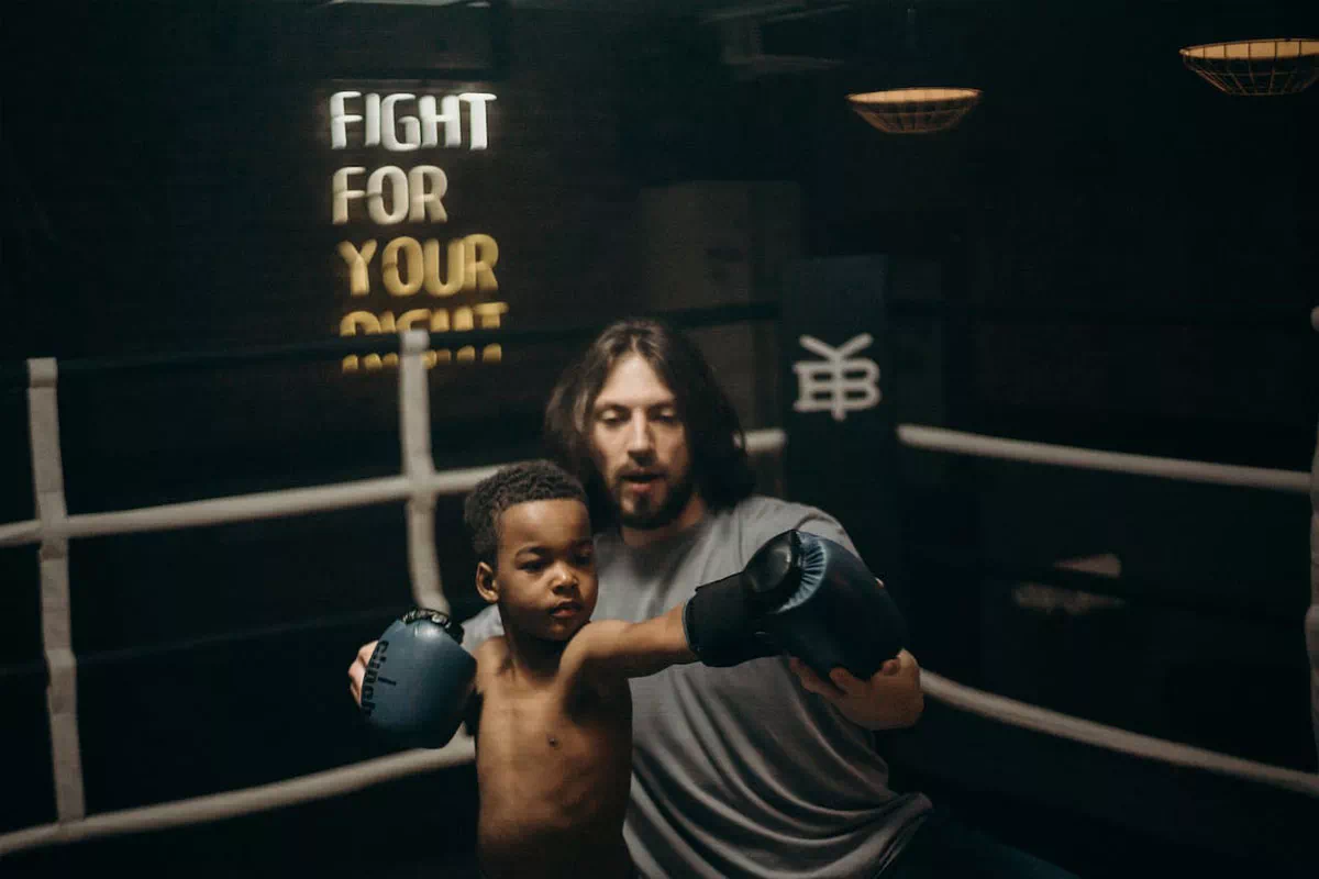 mindful-movements.org-activities-crsl-boxing-young-boy-with-coach