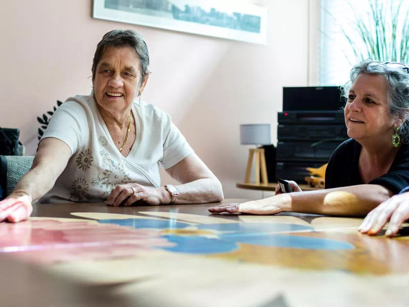 mindful-movements.org-program-special-needs-p2-senior-females-play-interactive-table-top-game