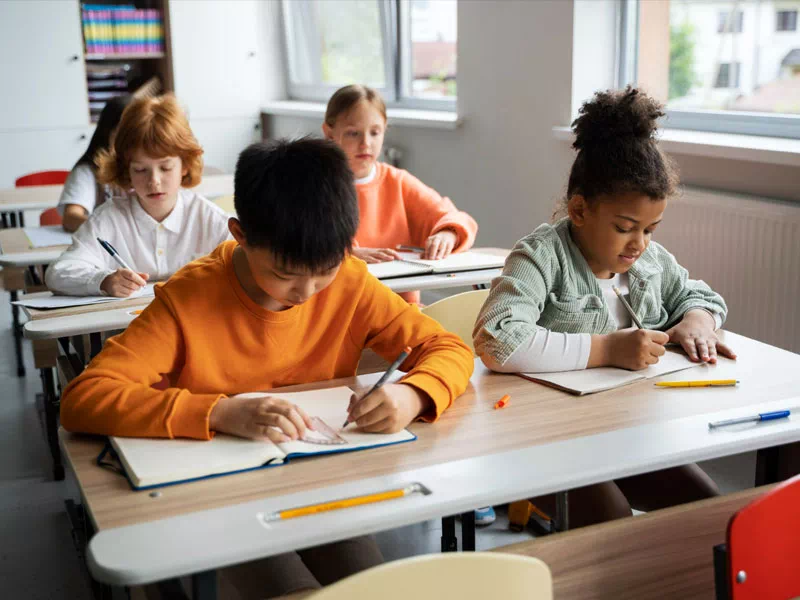 mindful-movements.org-program-education-training-p2-diverse-kids-learning-seated-at-table