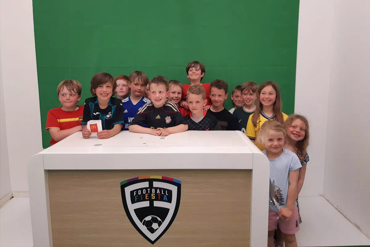 mindful-movements.org-activities-crsl-football-fiesta-kids-photo-opp-with-green-screen