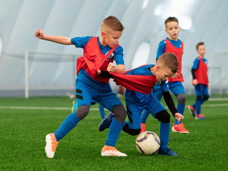 mindful-movements.org-activities-crsl-football-kids-young-boys-playing-football-competitively