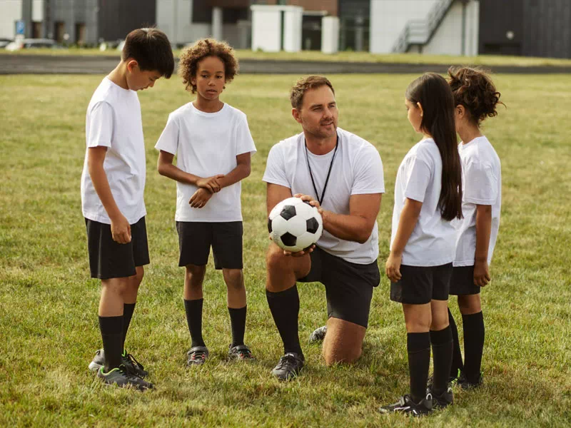 mindful-movements.org-activities-crsl-football-mixed-kids-with-coach